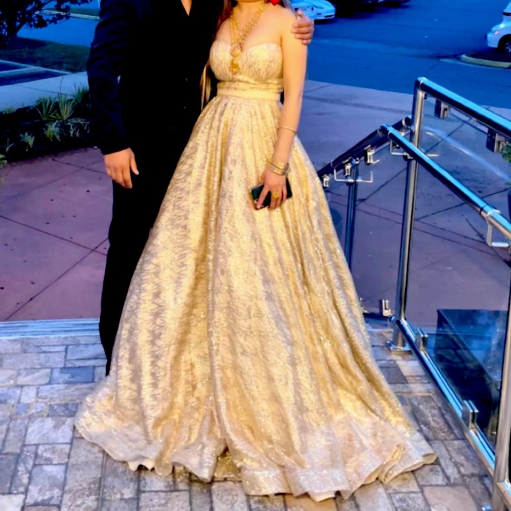 This dress is ball gown is long and gold color . I bought from Jadore evening.
